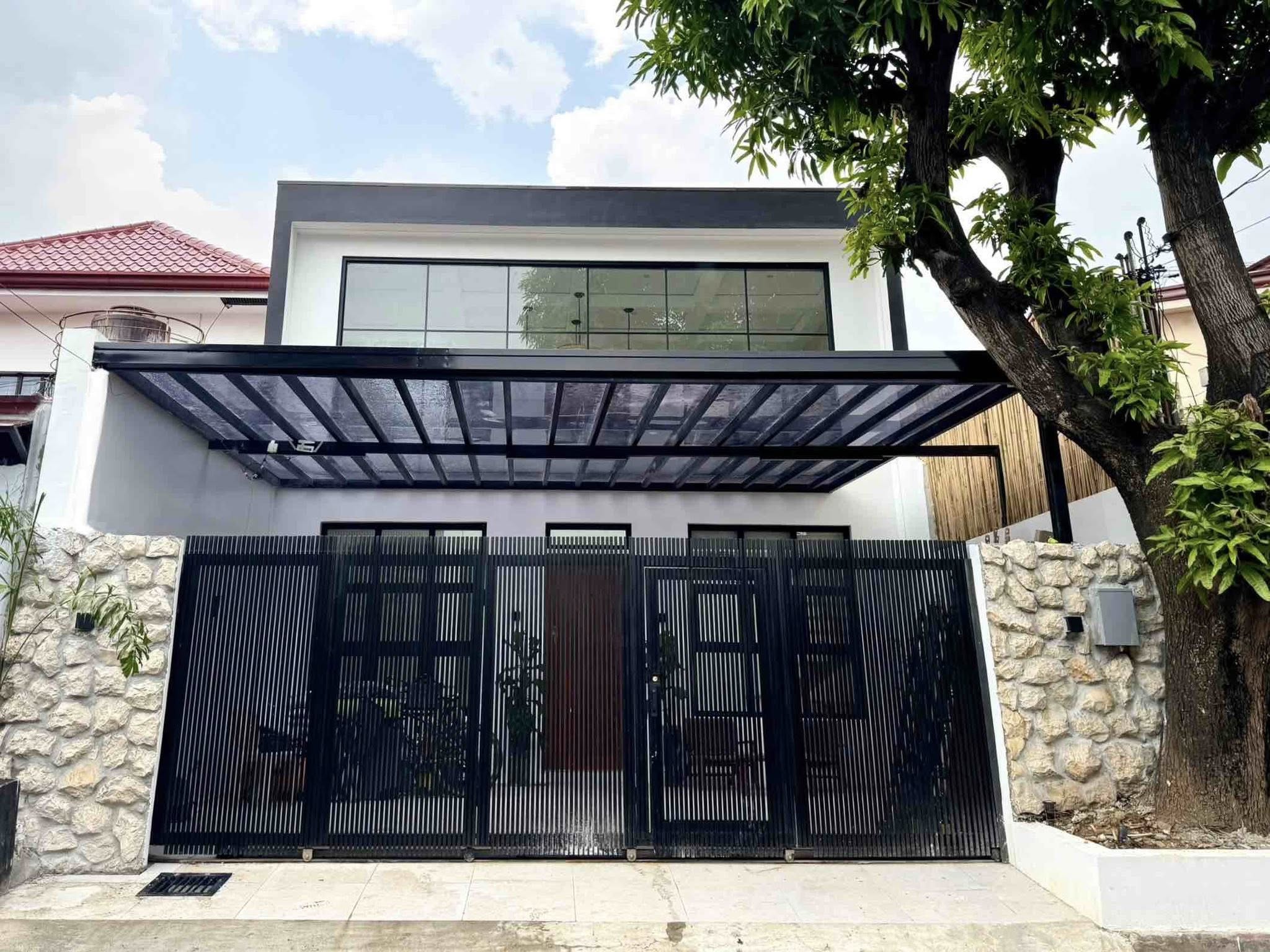 Beautiful3-BedroomHouseandLotforSaleinGreenwoodsExecutiveVillage,CaintaRizal-1.jpg